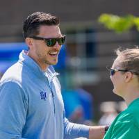 Players smile and shake hands at the end of the Tournament